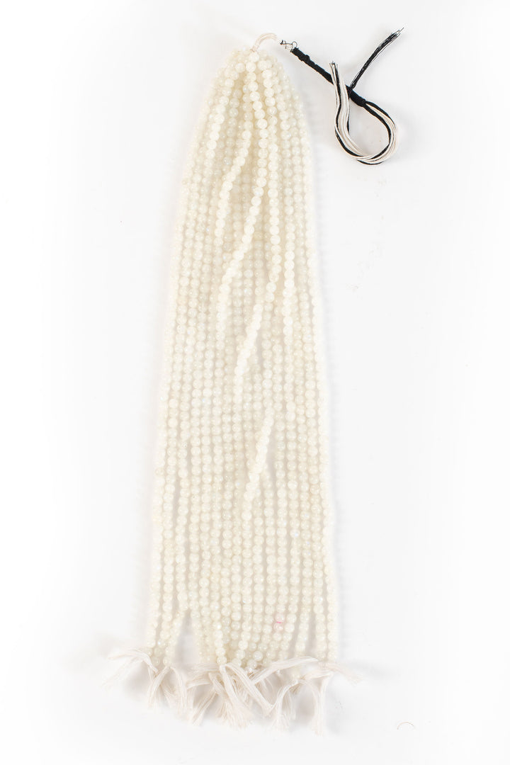 Moonstone beaded mala on white background